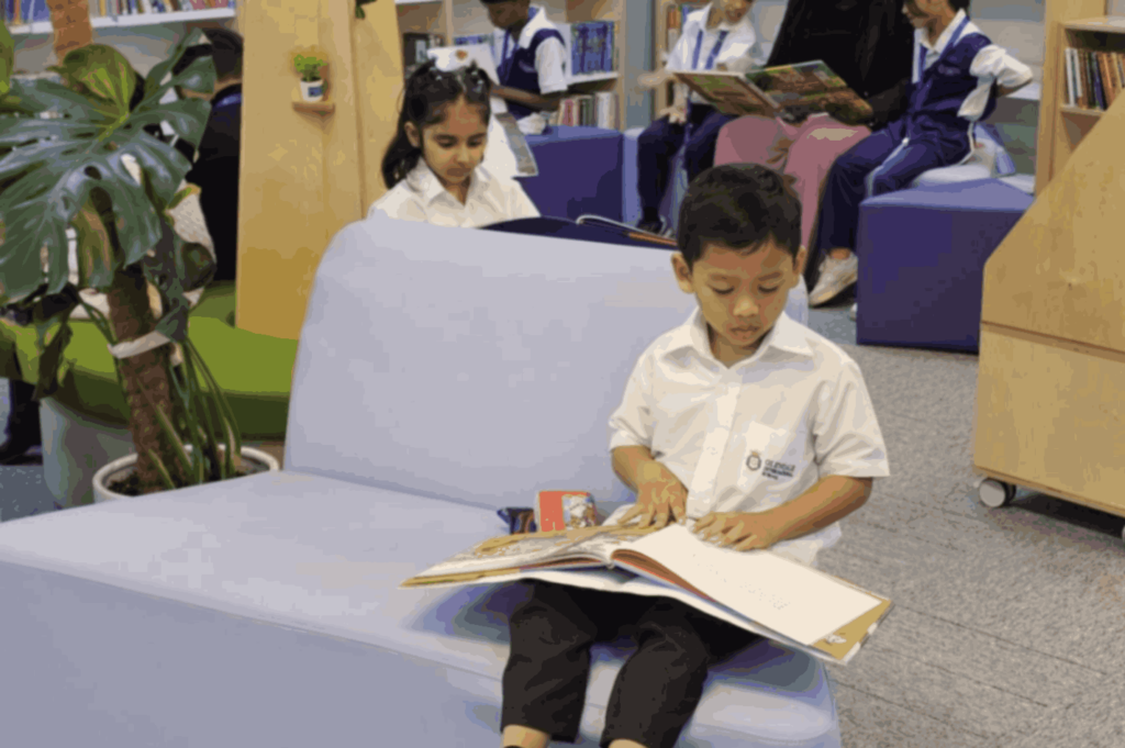 student reading his book and enjoying his time