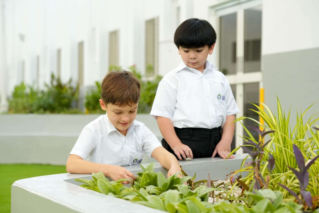 kids playing with plants