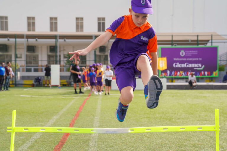 kid jumps while participating in a school activity,