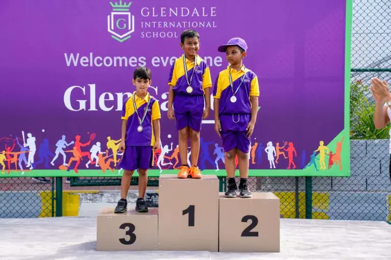 boys on the stage after wining