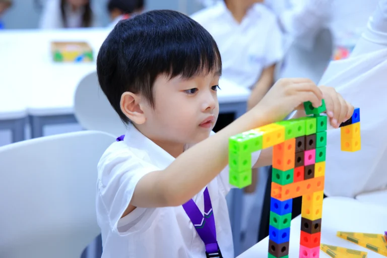 Student working on his Lego