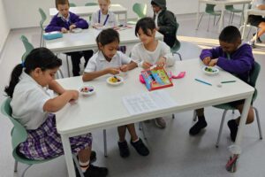 little students working in the workshop