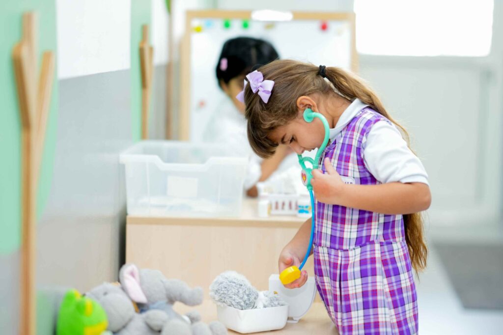 little students playing with games